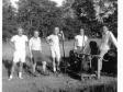 Members of The Southern RI DX and Propagation Society (Field Day 1964) left to right: Howard Allen W1BFB, 
Walter Tefft W1WAN, Roy Fuller W1CJH, Raymond Hurlbut W1LWA, Robert Merriam W1NTE and a Leroi 10kw gas generator.
It probably took all of them to carry the generator.
The young man on the right, W1NTE is now (42 years later) the curator of our amazing New England Wireless and Steam Museum on Frenchtown Road in East Greenwich.