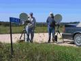 KC0P left and WB0LJC right set up on Jefferson Ridge EN43HN
201 km to Buck Hill and 99 km to WI, EN24SX. In the background we can see the horizon towards Buck Hill. With
binoculars we could see the grain elevators in Caledonia,
about eight miles.