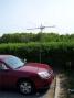 Here is WB2AMU's portable Six Meter setup during the June VHF contest, using a three-element Yagi on an umbrella stand at one of the higher hills of Long Island.