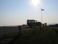 The sun over Narragansett Bay looked hot, but notice the nice breeze as indicated by the flag.