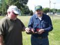 100_1184.jpg - Two hams "pan handling" at Field Day 2007
