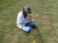 Cathy N5WVR making adjustments to the antenna masts.