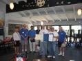 Howie, WB2AWQ, and Rocco, KC2HRG, co-chairmen of 10-70 Field Day; admire proclamations and resolutions as Freeholder Julie O'Brien, Mike, WA2MWT, Ramsey OEM Coordinator; Councilmen Art Nalbandian and Andrew Siemsen; Paul, KC2CJW, 10-70 President; Herb, N2OPJ, 10-70 Treasurer; and Paul, KC2FMJ, Ramsey OEM member; look on.  Photo by Lou, N2CYY.