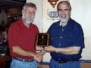 RI Asst SM and ACC, Bill Whetstone WA1RI is leaving RI for Florida and his friends honored his service with a dinner and special plaque thanking him. Picture shows Bill receiving his plaque and a handshake from RI SM, W1YRC