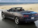 The 2011 Chevrolet Camaro convertible -- available February 2011 -- features its AM/FM radio antenna inside the spoiler, thanks to some ham ingenuity. The "shark fin" antenna is for satellite radio, OnStar and cellular signals. [Photo courtesy of General Motors]