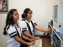 These Sacred Hearts students download information and confirm the radio frequencies to prepare for a telebridge contact. [Photo courtesy of Sacred Hearts Academy and NASA]