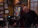 In the opening scene of the January 3 episode of Last Man Standing, viewers get their first glimpse of Mike's shack -- and his impressive wall of ARRL awards and QSL card collection. Mike's wife Vanessa (played by Nancy Travis) and his boss Ed (played by Hector Elizondo) also appear in the scene. [Screngrab courtesy of ABC]