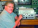 Former QST Technical Editor Stu Cohen, N1SC, with the Johnson Viking Ranger II transmitter that he built after finding the unbuilt kit in a box in the basement of W1AW. Cohen passed away January 3 from cancer.