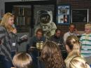 At Kopernik Observatory, a student, Kim, asks a question. Control operator Drew Deskur, KA1M (L), and back-up op Mike Gruszka, N2NW, tend to the radio gear in the background. 