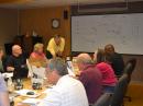 ARRL Education and Technology Program Coordinator Mark Spencer, WA8SME (in the yellow shirt) led the TI-1 session held at ARRL Headquarters. [Amy Strickland, photo]