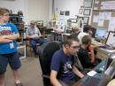 A busy radio room during a contest at K8DAR. [Ed Engleman, KG8CX, photo] 