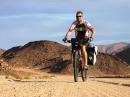 Cyclist Thomas Andersen, OZ1AA, rides across Namibia during his round-the-world tour. [Courtesy of Thomas Andersen, OZ1AA]