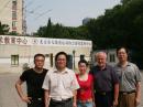 Min, BG1MIE, Mr Lee, BG1JDW, a CRSA staff member, the author and a local visitor outside the CRSA Beijing headquarters.