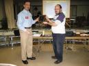 Milwaukee Radio Amateurs Club President Howard Parks, AB9FH (right), accepts a plaque from ARRL Sales and Marketing Manager Bob Inderbitzen, NQ1R, on behalf of the club. The ARRL Recognition Award was given on mark the occasion of the clubs founding in 1917 and the upcoming 90-year anniversary of their ARRL Club Affiliation.