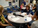 From left: Heather Gregory, Brianna Edgemon and Blair Francis wait for the telebridge connection with our ham mentors and classmates from the Decatur Middle School Science Club.