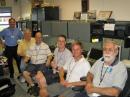 Dura (second from left) met with VoIP Net Managers at WX4NHC. [Julio Ripoll, WD4R, Photo]