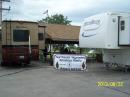 Our Club banner and the campers set up for wind break. They didn't slow the storm much when it came through, but we tried. The after action report showed that the positioning of the RVs probably created a venturi effect funneling in more wind than they slowed.