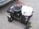 Another view of the GFN2+. The handles that are used to move it (like a wheelbarrow) are removed to make chock blocks and to make the unit smaller. Other features are a 165 amp truck alternator (internally regulated), a 750 watt power inverter, a 12 hp power plant, and, of course, the Sportster fuel tank.