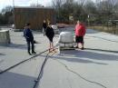 The crew inspects the lines and antennas prior to start.  (Forgreound L-R:  Angelo, K0CAM, AC0CO; Backbround L-R: Cole, KD0EWB)