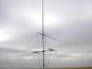 Sunday calmer weather allows me to hoist the 50 mhz yagi full height, after piecing it back together.