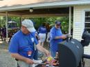 Dave N8DPW and Danny KB8STK getting the Field Day Supper ready. Nothing like a good Hot Dog or Brat to keep you pushing the mic or Producing those Dits and Dahs