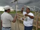 Another pic that looks surreal, mouting the antenna while the thunderstorm is "menacing".