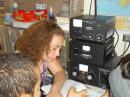 Chloe capturing a callsign in the book.