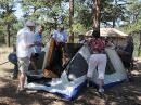 How many hams does it take to set up a tent?
