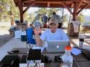 Jim Andrews KH6HTV setting up the GOTA station for use with PSK-31 while giving us the Hawaiian traditional Shaka sign telling us all to "hang loose".