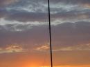 Bill, NB3B working 40M phone as the sun sets over the K3PZN group.