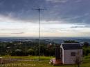 Looking from South to North. Main yagi on foreground. A rainy sunset with fog on the horizon.