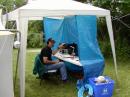 Jim VE3EEZ at the 15m-160m Station.  He is near the observation deck under the cross.