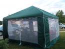 N9OQU operating the station in our new operations tent - the storms of last year's Field Day ruined several tents - we like the replacements though!! 