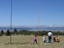 20-meter phased array antenna setup, with assistance from Myron's daughter Kira. The broad meadows of Pike National Forest give virtually unlimited room for HF antenna farms.