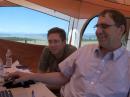Dean, K0MKT (right), demonstrates PSK31 to prospective ham Jim Hogan.