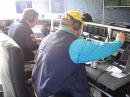 Inside the SPARC (Shore Point Amateur Radio Club) Mobile Communications Unit.
(l to r) SPARC club Treasurer and repeater trustee Brian Freeman, K1SOX, works 40 meters, while guest Amateur Radio Operator Doug Sharafanowich, WA1SFH, works 20.  West-Walk beach walkway, Saven Rock Park, West Haven, Connecticut.