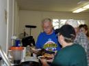 Larry Macionski, W8LM's shining face shows is appreciation for the excellent Barbeque supper prepared by Don Urban, KC0BVX and supplied by Samantha Wing, KC0MTM.