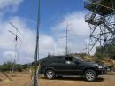 Looking toward the North, a stacked pair of Cushcraft 13B2's with vertial yagi's for 144 and 220, and to the left, M2 220-5WL and 432-11WL yagis - verticals / omni's are on the fenceline