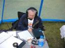 Jacket, headphones, cup-o-snacks (thanks Arlene), a cool beverage, lots of hams to talk to.  Life is good.