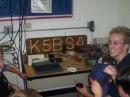 Jordan, KE5BRT, assists cub scouts in contacting others on D-Star and IRLP.