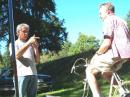 Chuck, AC7QN, the inventor of the bike generator and regulator... surveys the situation while Rich, AE7RW, rides on and on and on. "It'll be better next year", promised Chuck.