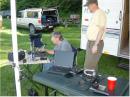 Portable Packet, Satellite, APRS and WIFI attracted lots of interest. Here Jim Kohler, AC7UM and Greg Rehm, KD7RCG are checking out the Packet setup. 