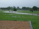 The park where we operated has a normally quiet flowing creek meandering through it. On this occasion, a "raging river" seemed a more apt description. Hmmm...what do we do if the creek rises another 6 inches? I suppose that would be "Plan C." :-)