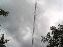 This is 16 5 element 144 MHz yagis fixed on one leg of a 130 ft Rohn 45 tower. A rotatable quad yagi array is on the top. We thought it worked very well.