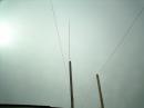 20 meter vertical over tin roof. Looks ugly but performs great!