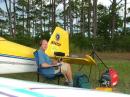 This is KA4AXS (opr: Ned) operating from the tail of an experimental RV-4 aircraft using a Honda EU2000 generator and a Buddipole in the vertical position at Dog Island, FL.