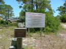 Information on Dog Island, FL posted on a sign in the aircraft parking area.  Dog Island's runway is grass with lots of sandy spots.  Landing can be a challenge...
