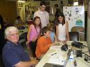 Tom, KG6YVZ with youngsters making contact.