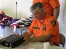Ralph, KA6FDI, Solano Sherriff's Dept checking out our rig.