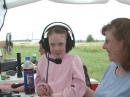 Mary's, (KC9FVS) youngest daughter Kayla ready to run 15 Meters with Mom's control op help.